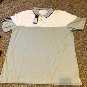 Adidas polo shirt. Brand new with tags and original packaging.